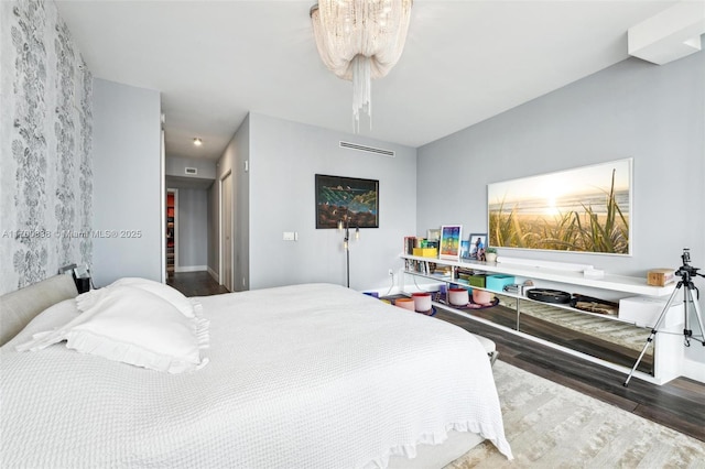 bedroom featuring dark wood-type flooring