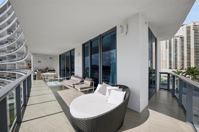 balcony with an outdoor hangout area