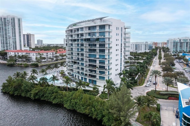 view of building exterior featuring a water view