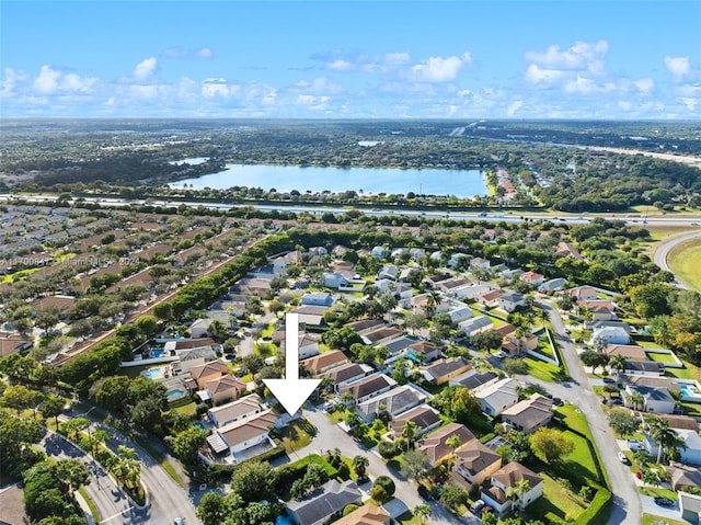 drone / aerial view featuring a water view