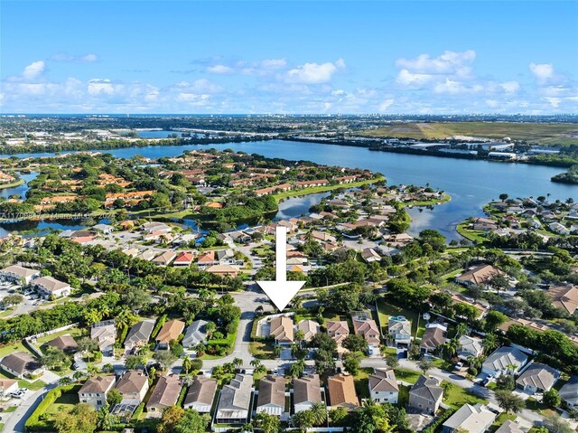 1226 SW 46th Ave, Deerfield Beach, FL 33442 - aerial overview of property's location with a large body of water and nearby suburban area