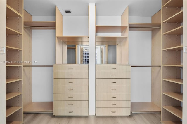 walk in closet featuring light wood-type flooring