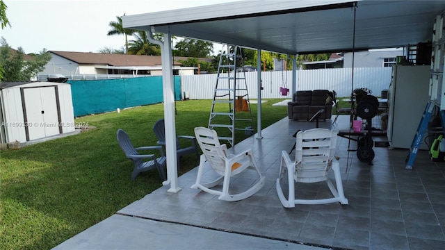 view of patio / terrace featuring a storage unit