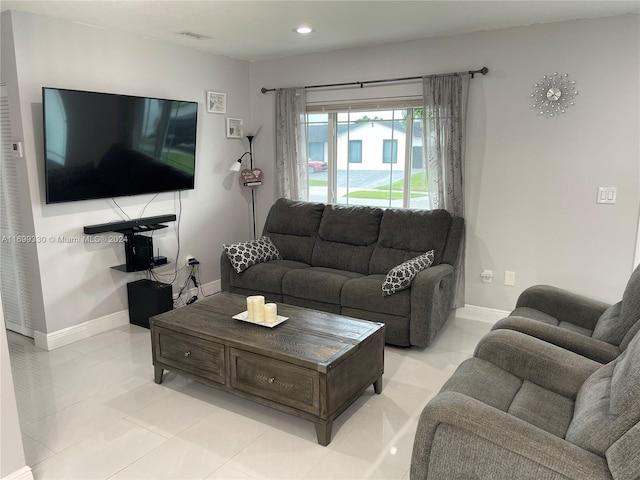 living room featuring light tile patterned floors