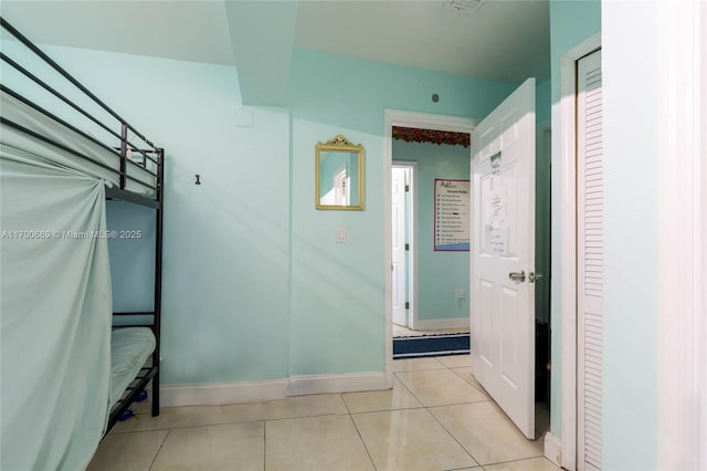 bathroom with tile patterned flooring