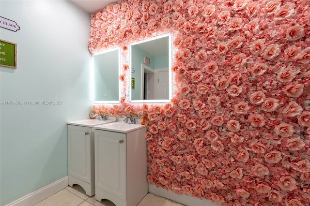 bathroom with tile patterned flooring and vanity