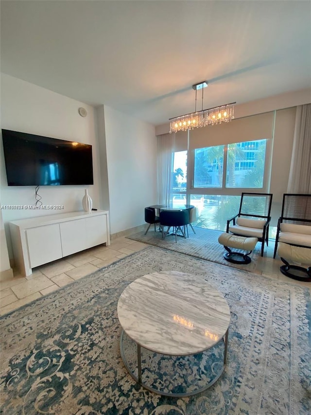 living room with a chandelier