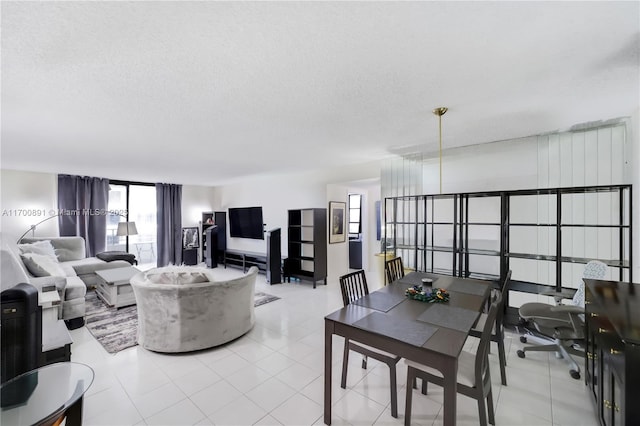 600 Three Islands Blvd Unit 1021, Hallandale Beach, FL 33009 - living room with light tile patterned floors and a textured ceiling