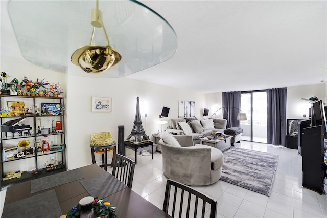 living area featuring light tile patterned floors