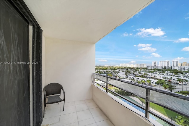 balcony featuring a city view