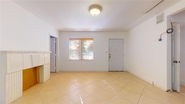 interior space featuring light tile patterned floors