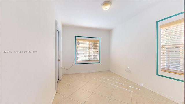 view of tiled spare room