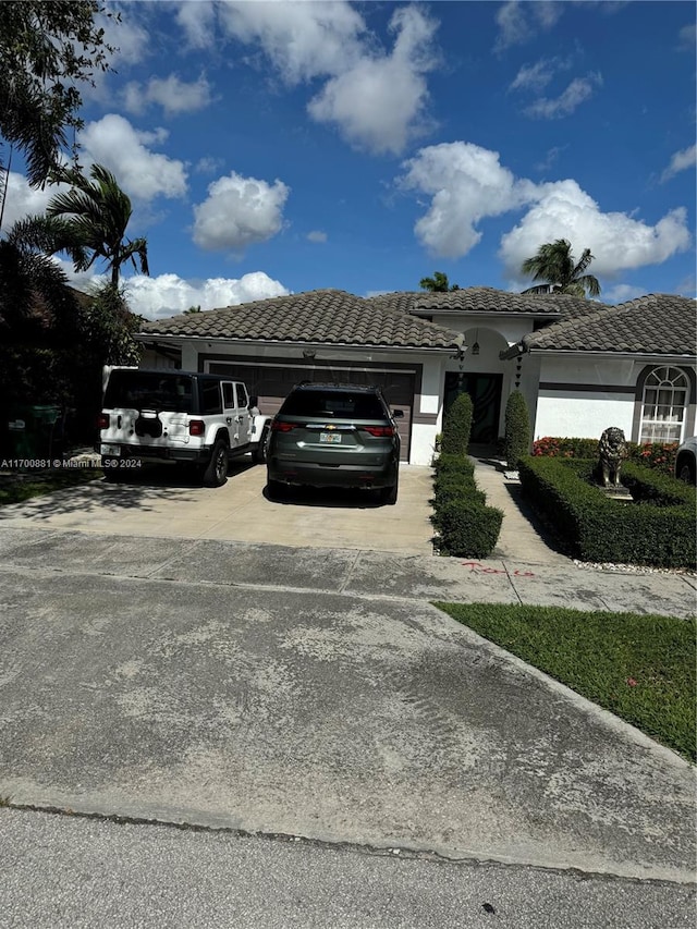 exterior space with a garage