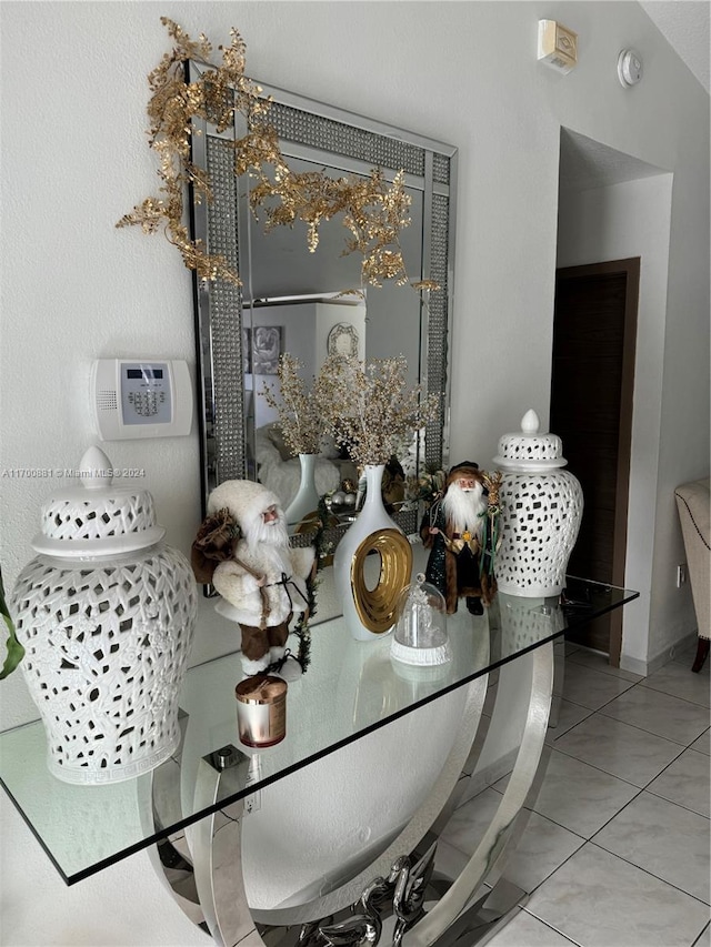 dining area featuring light tile patterned flooring