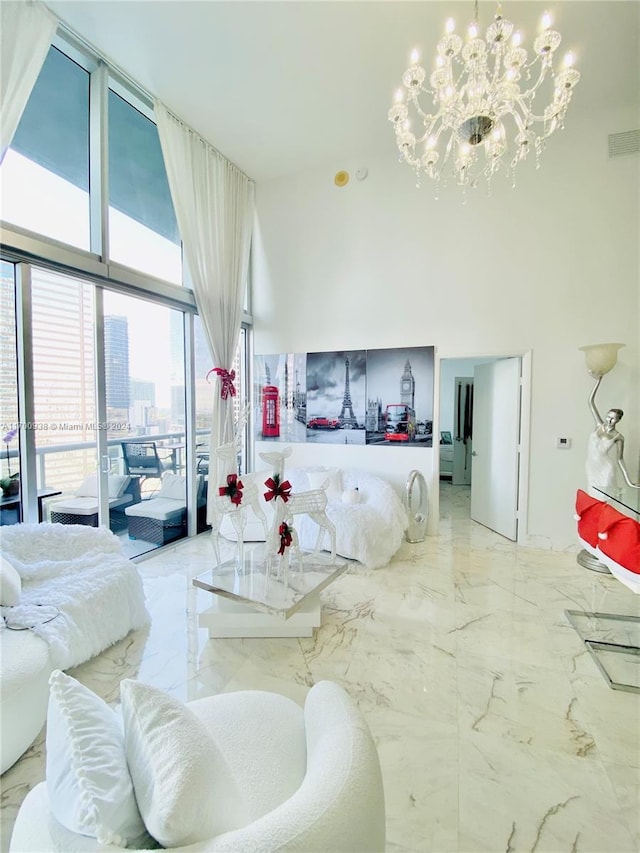 living room with expansive windows and an inviting chandelier