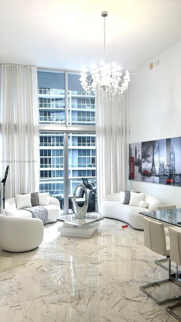 living room featuring a chandelier