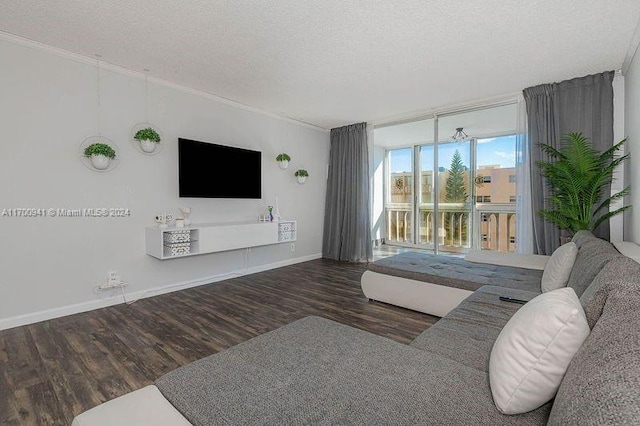 living room with a textured ceiling, crown molding, and dark wood-type flooring