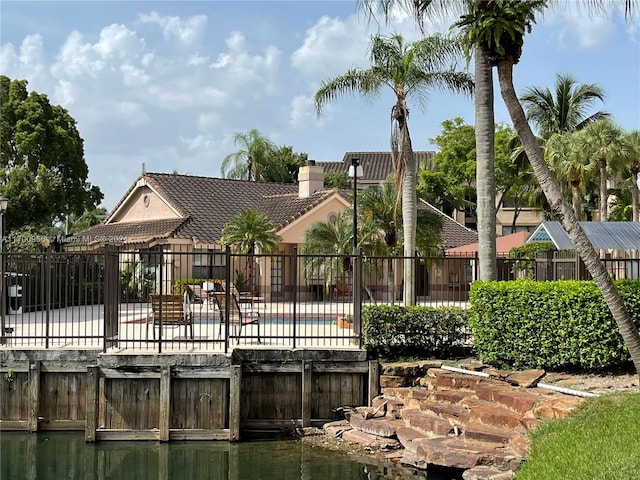 exterior space with a water view