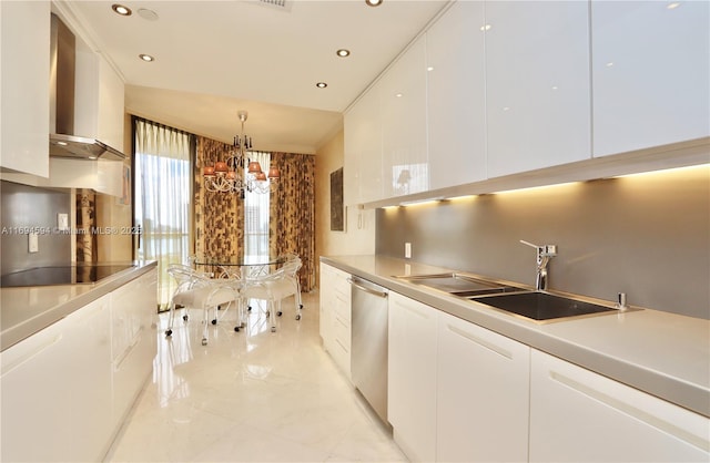 kitchen with pendant lighting, white cabinetry, black electric stovetop, stainless steel dishwasher, and wall chimney exhaust hood