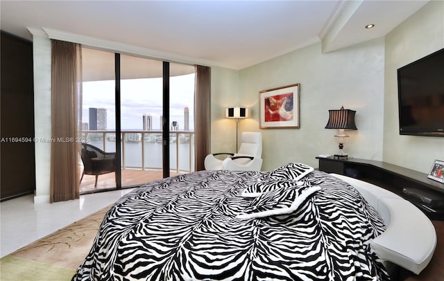 bedroom featuring ornamental molding, floor to ceiling windows, and access to outside