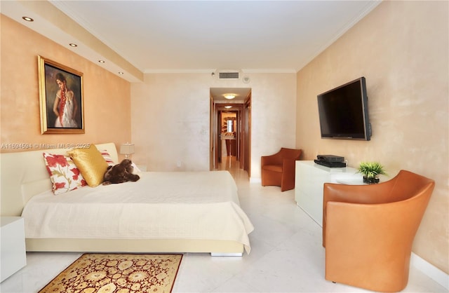 bedroom featuring crown molding