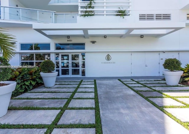 entrance to property featuring french doors