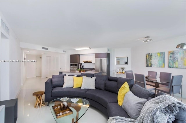 living room featuring sink