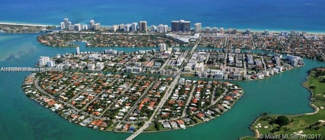 bird's eye view with a water view