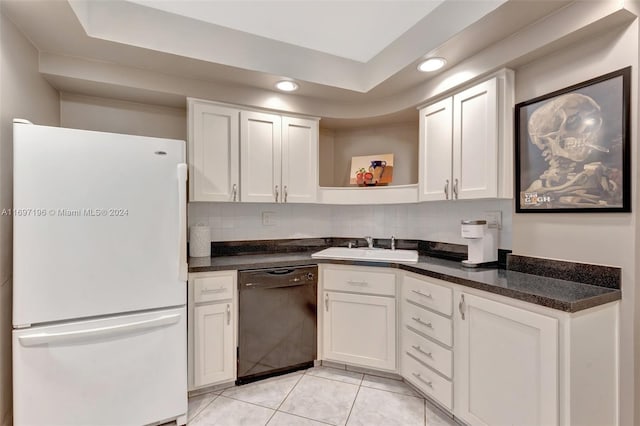 kitchen featuring decorative backsplash, sink, white refrigerator, dishwasher, and white cabinetry