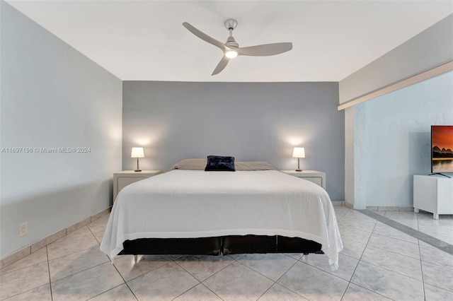 bedroom featuring light tile patterned floors and ceiling fan