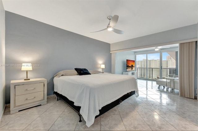 bedroom with light tile patterned floors and ceiling fan