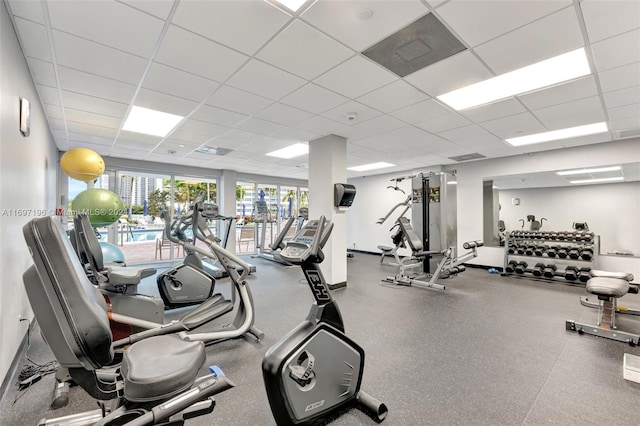 workout area with a drop ceiling