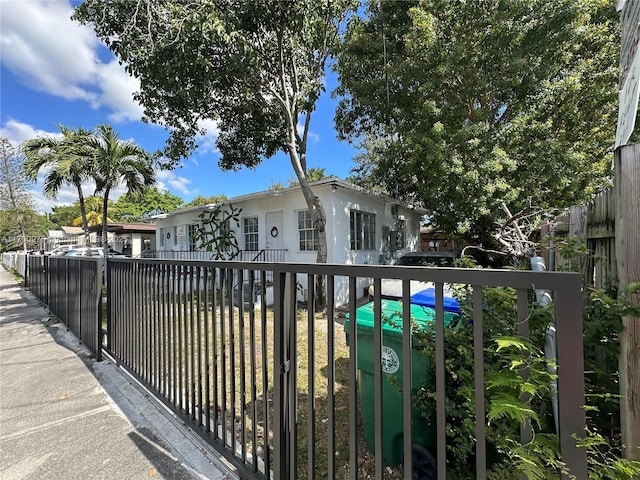 view of gate featuring fence