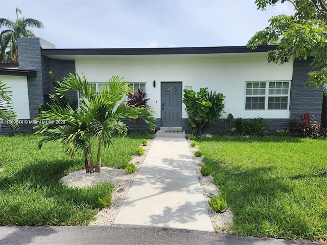 view of front of house with a front yard