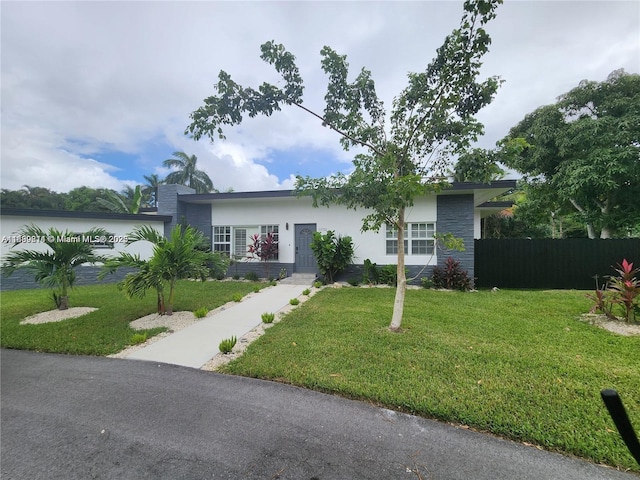 13751 NE 1st Ave, Miami, FL 33161 - single story home featuring stucco siding and stone siding