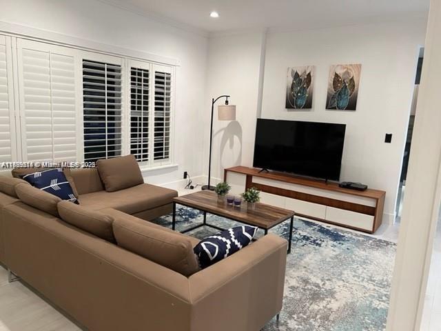 13751 NE 1st Ave, Miami, FL 33161 - living area featuring recessed lighting and ornamental molding