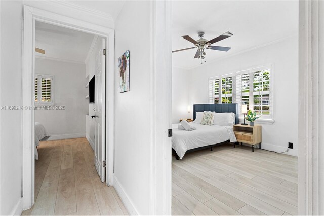 13751 NE 1st Ave, Miami, FL 33161 - bedroom with ornamental molding, light wood-style flooring, and ceiling fan