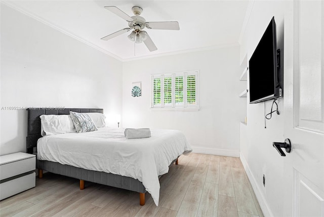 13751 NE 1st Ave, Miami, FL 33161 - bedroom featuring crown molding, light wood-type flooring, and a ceiling fan