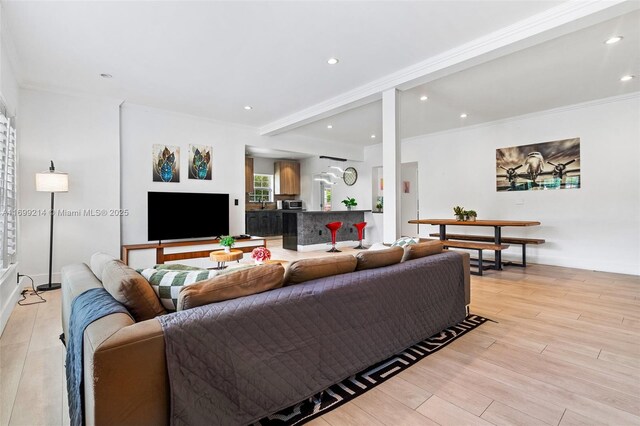 13751 NE 1st Ave, Miami, FL 33161 - living room with light wood-style floors, recessed lighting, and crown molding