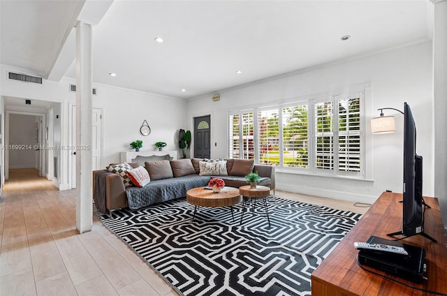 13751 NE 1st Ave, Miami, FL 33161 - living room featuring light wood-type flooring, crown molding, and recessed lighting