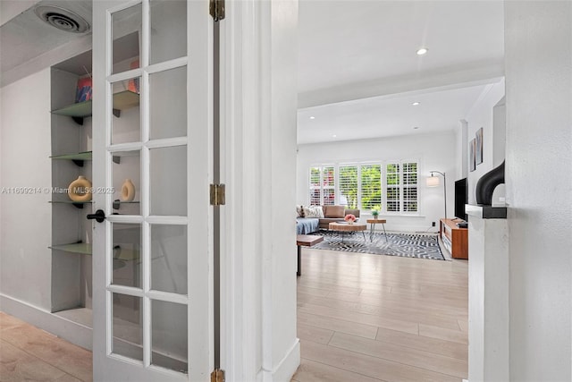 13751 NE 1st Ave, Miami, FL 33161 - hallway featuring wood finished floors and recessed lighting