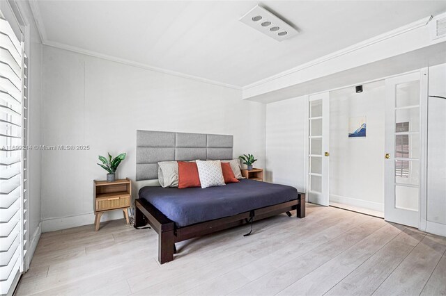 13751 NE 1st Ave, Miami, FL 33161 - bedroom with wood finished floors and crown molding