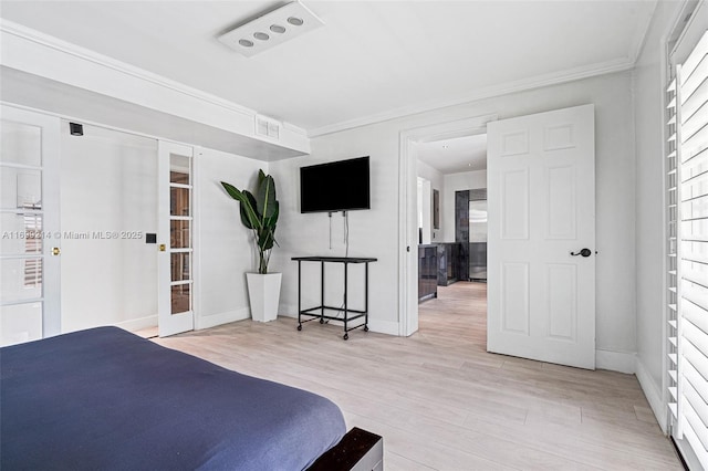 13751 NE 1st Ave, Miami, FL 33161 - bedroom featuring french doors, wood finished floors, multiple windows, and ornamental molding