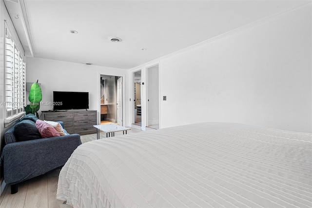 13751 NE 1st Ave, Miami, FL 33161 - bedroom with light wood-type flooring and ornamental molding