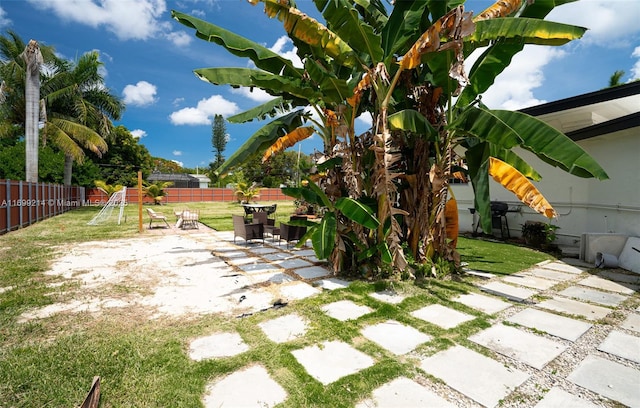 13751 NE 1st Ave, Miami, FL 33161 - fenced backyard featuring a patio area