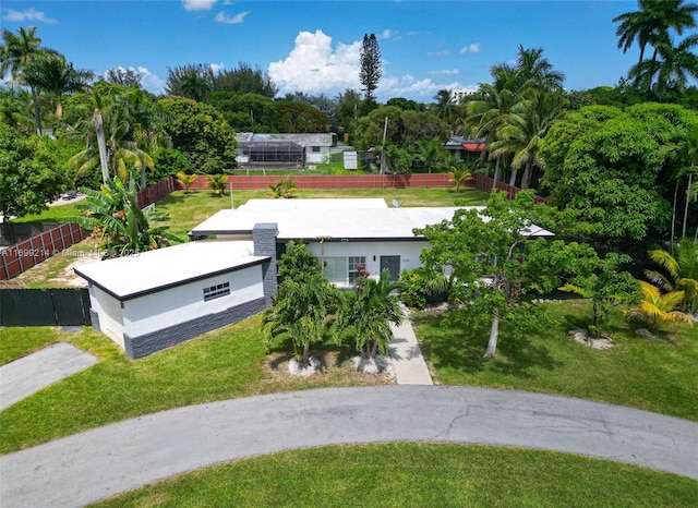 13751 NE 1st Ave, Miami, FL 33161 - view of front of property with view of wooded area and stucco siding