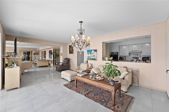 living room with an inviting chandelier