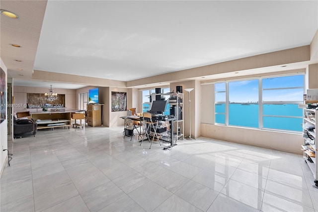 unfurnished office with light tile patterned flooring, a healthy amount of sunlight, and an inviting chandelier