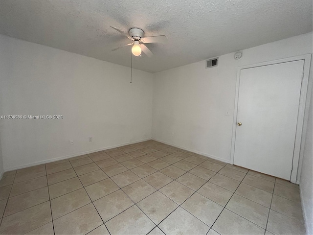4015 W Mcnab Rd Unit D101, Pompano Beach, FL 33069 - empty room with ceiling fan, a textured ceiling, and light tile patterned floors