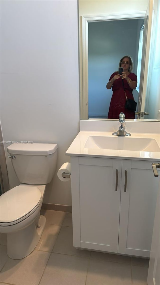 4015 W Mcnab Rd Unit D101, Pompano Beach, FL 33069 - half bathroom with tile patterned flooring and vanity